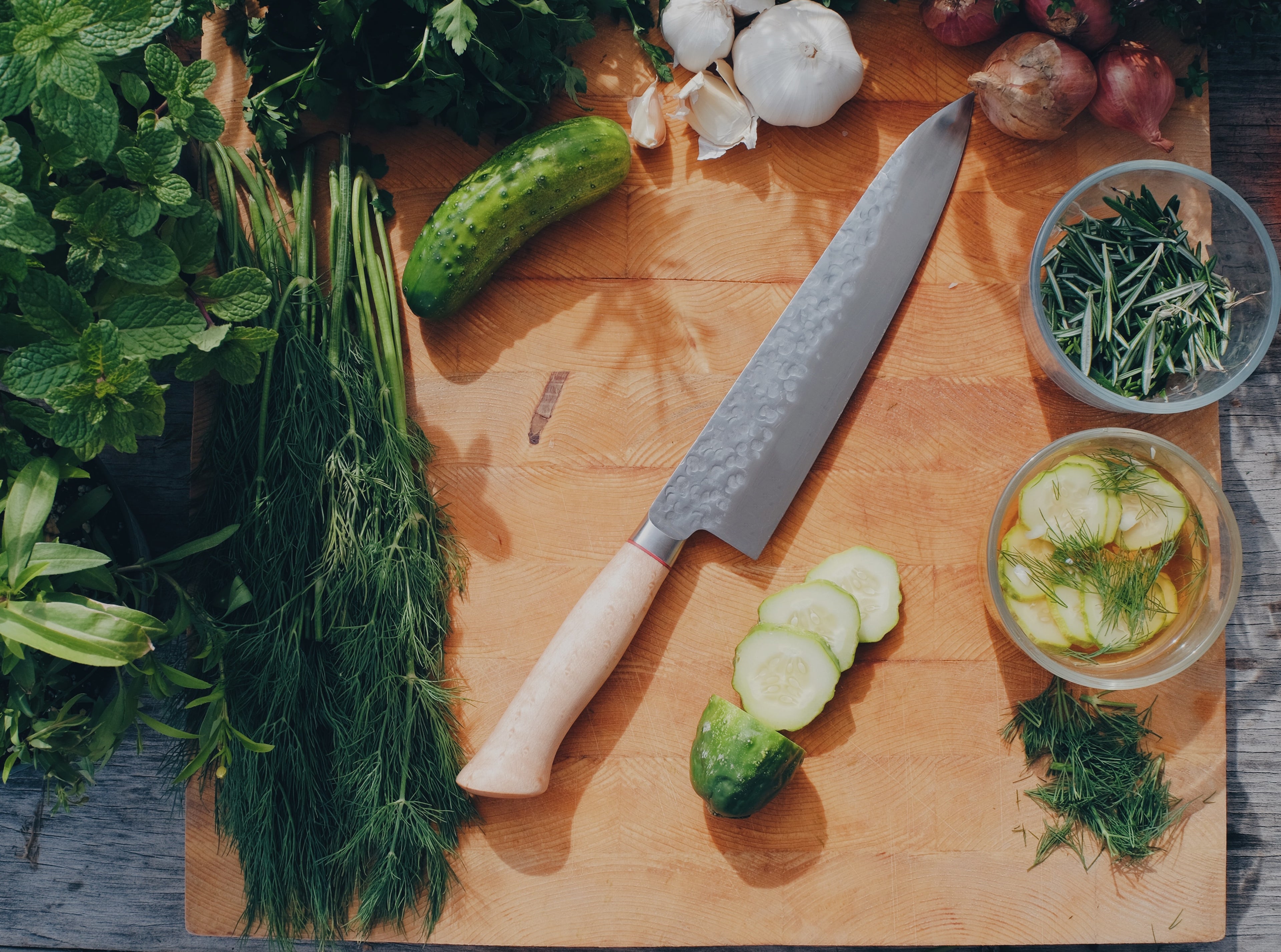 Sharpen Up 365 Chef's Knife on Wooden Cutting Board